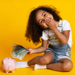 kid playing with money